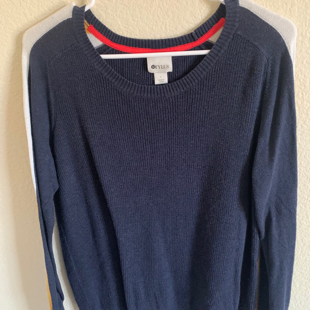 blue and yellow striped sweater